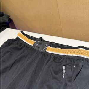 Nike Black Shorts with Gold Stripe